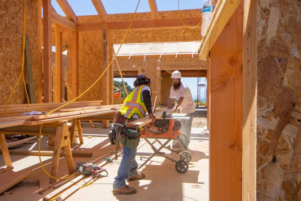 construction workers are a large part of the high cost of building a custom home. 