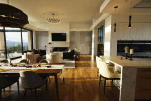 well lit living space with modern details in a large custom home